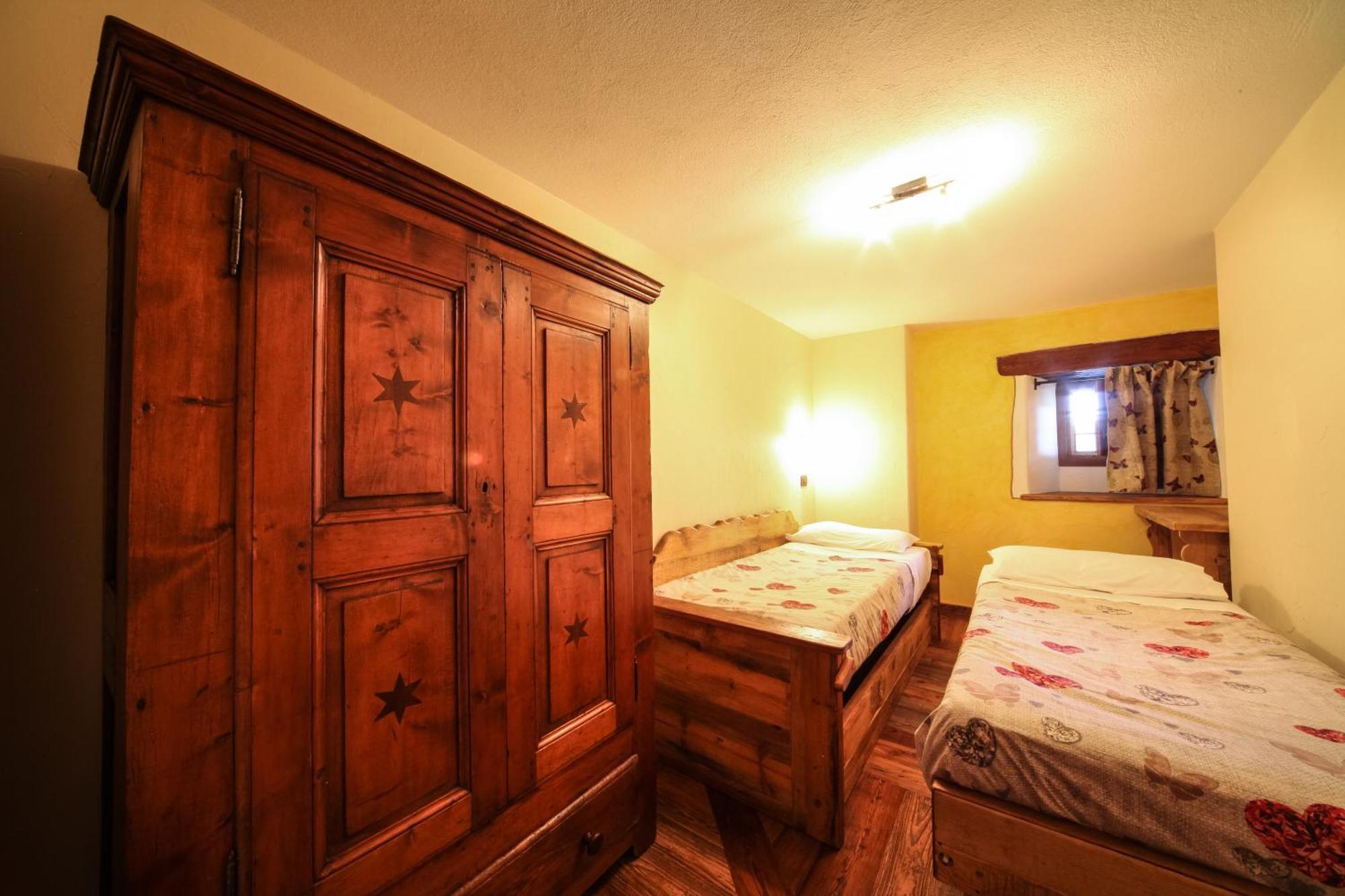 Appartement Souvenir De Tsaneli à Roisan Chambre photo